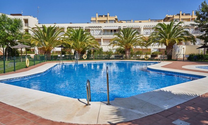 Isla Cristina Apartment | Beachfront apartment, with pool and urban areas. Zarati