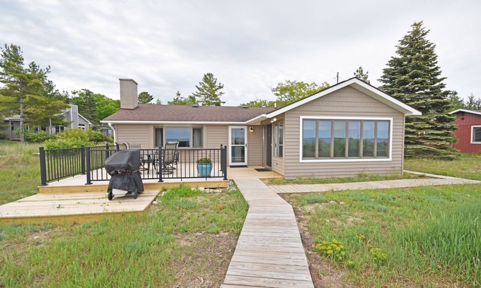 Glen Arbor Cottage | Beachfront cottage with Lake Michigan views, fireplace, gas grill, firepit, deck