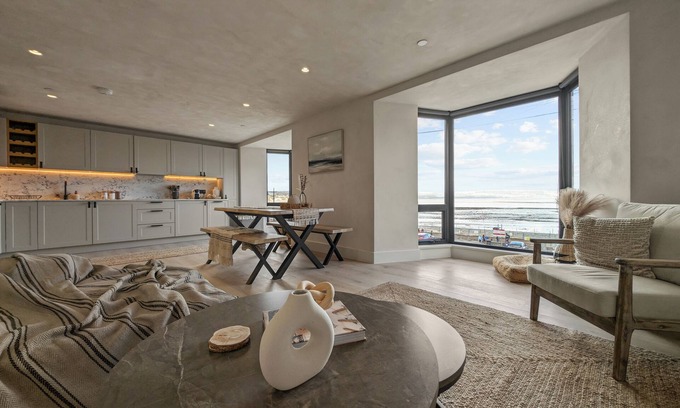Mumbles Apartment | Beachfront eco-friendly apartment with ocean view and modern interior sleeping up to 6