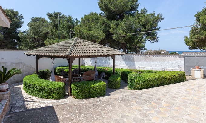Sant'Isidoro Ski Chalet | Beachfront vacation villa next to sandy Ionian coast m525