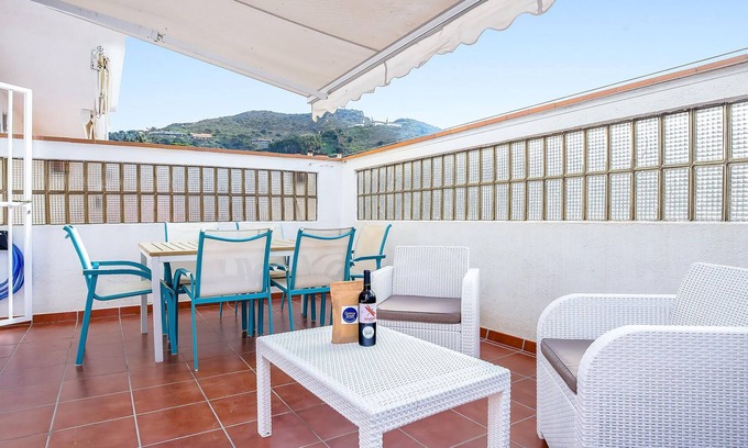 Port de la Selva Apartment | Beachside Ground Floor Apartment in Port de la Selva - Mountain Views, Terrace, WiFi, Parking