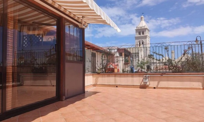 Santa Maria Apartment | Beautiful attic room with cathedral view