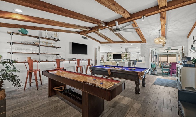 Caloosahatchee House | Beautiful Dog Friendly Home with Screened-in Heated Pool, Game Room/Bar