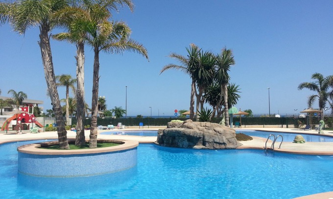 Torre de la Horadada Apartment | Beautiful new sunny, directly overlooking the sea, two minutes from the beach.