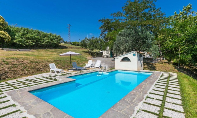 Rosignano Marittimo Villa | Beautiful apartment in villa for 10 guests with pool, TV, pets allowed and parking