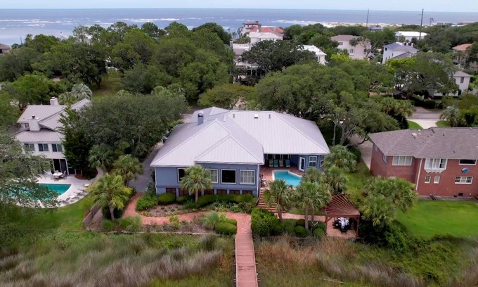 East Beach House | Beautiful Large Home with Pool, Riverfront Dock, Gourmet Kitchen and Kids' Bunk Room.
