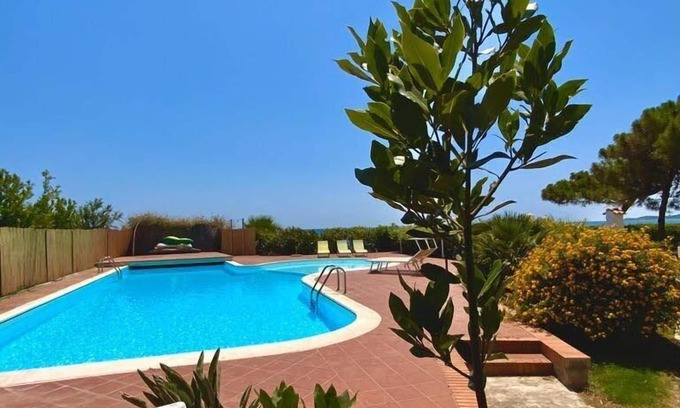Sarroch Villa | Beautiful Split Villa, Right On The Beach With Swimming Pool And Tennis Court!