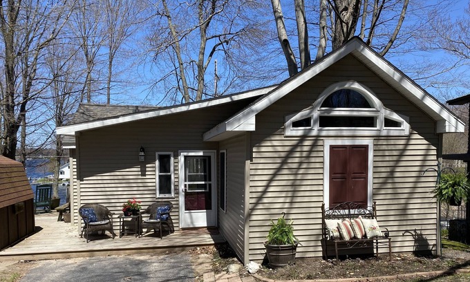 Ludington House | Beautiful sunsets --Waterfront cottage on Upper Hamlin Lake
