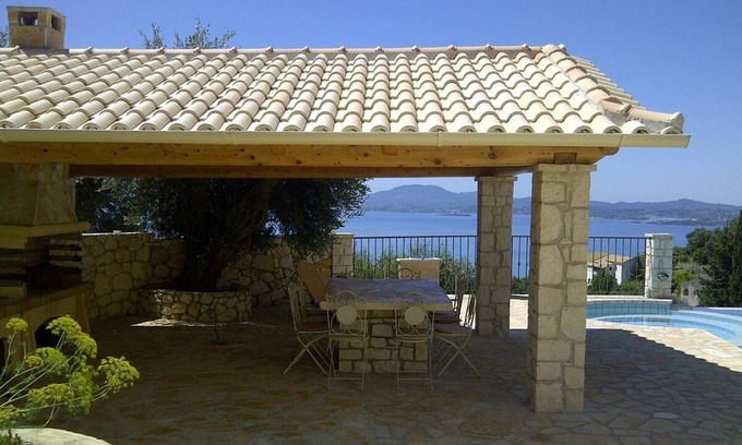 Barbati Villa | Beautifully Restored Olive Press, Private Pool, Jacuzzi, Stunning Sea Views 5 mins to Nissaki Resort