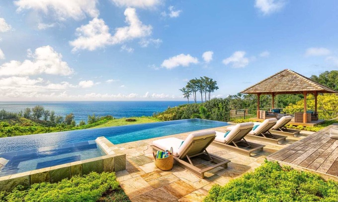 Kilauea House | Beauty and modernity meet in this standout oceanfront home perched above Secret Beach.