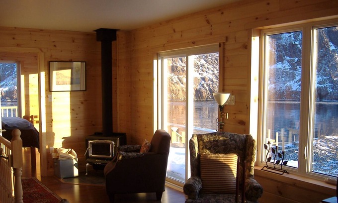 The Battery House | BEST CITY VIEWS, COTTAGE WITH LARGE DECK, ON THE HARBOUR. MININUM 31 DAY STAY