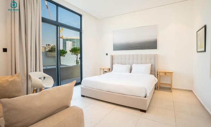Jumeirah Village Circle Apartment | Blue Breeze - Elegant 1BR with Private Jacuzzi & Terrace in JVC