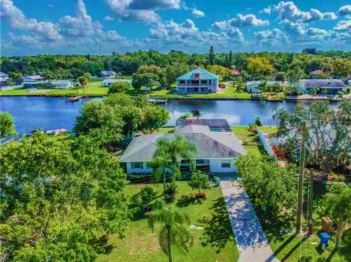 Ruskin House | Blue Heron House, Private 4 BR Waterfront w Heated Pool and Fire Pit
