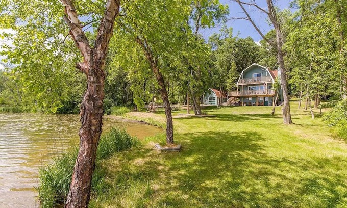 Breezy Point Cabin | Blue Ox Barn: a cozy Minnesota lakehouse with private beach and incredible views