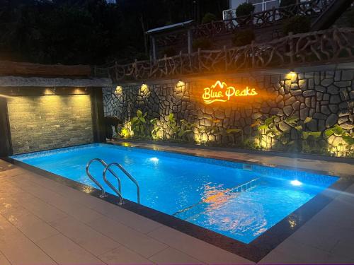 Devikolam Cabin | Blue Peaks Holidays Swimming Pool Cottage Munnar