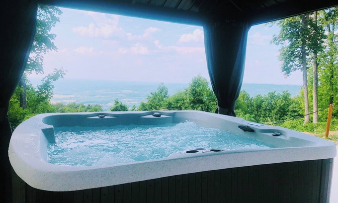 Morrison RV Rental | Bluff side retreat: luxury tent w/spa tub & breathtaking view near savage gulf