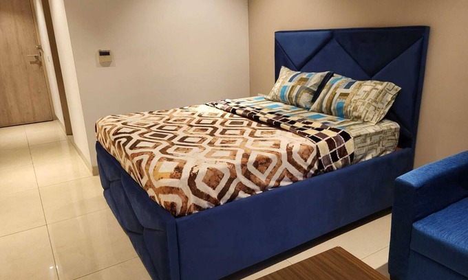 Gurugram Apartment | BnBBuddy Modern Studio with AC and WiFi in charming Gurugram