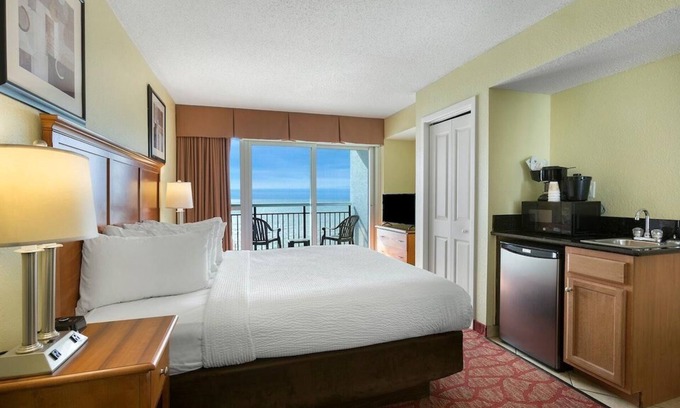Downtown Myrtle Beach Apartment | Boardwalk Breeze: Oceanfront Room with King Bed