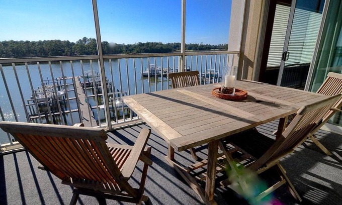 Gulf Shores Condo | Boat Slip - Pool- Screened balcony- Water front. 30 DAY MINIMUM STAY.