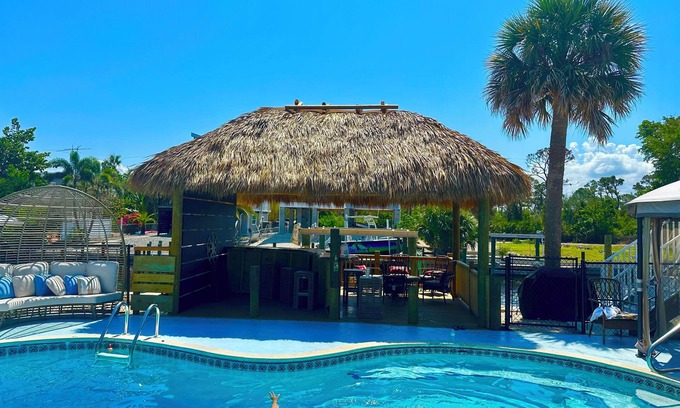 Bokeelia House | Boater’s Paradise! Beautiful Home on the Water with 2 Boat Lifts & Dockage Space