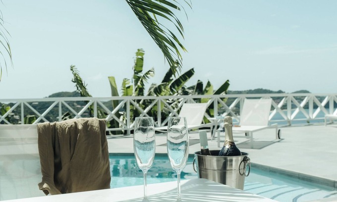 St. George's House | Boutique Villa with 15 bedrooms, pool, veranda, WiFi, AC and serene views