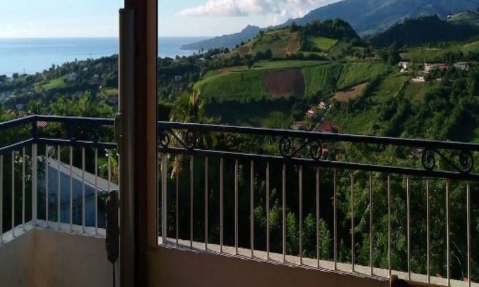 Le Carbet Apartment | Breathtaking view of the sea and Pelée mountain. 1st floor of villa with terrace.