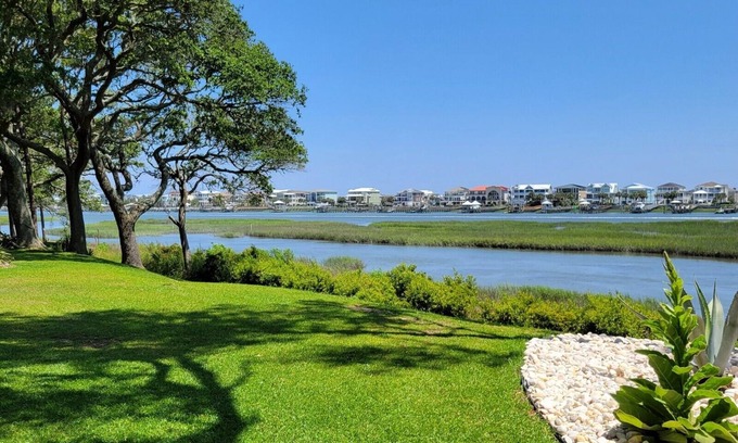 Ocean Isle Beach Apartment | Breathtaking Waterway Views. 1BR. 1Bath. Kitchen. Porch. 2 Person. A+ Views