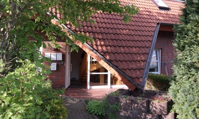 Dornum Apartment | Bright apartment (70 sqm) with all-round view right at the bottom - fishing, free WiFi