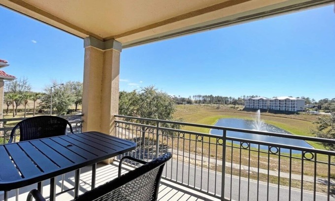 Regal Palms Condo | Bright condo with south facing balcony overlooking pond