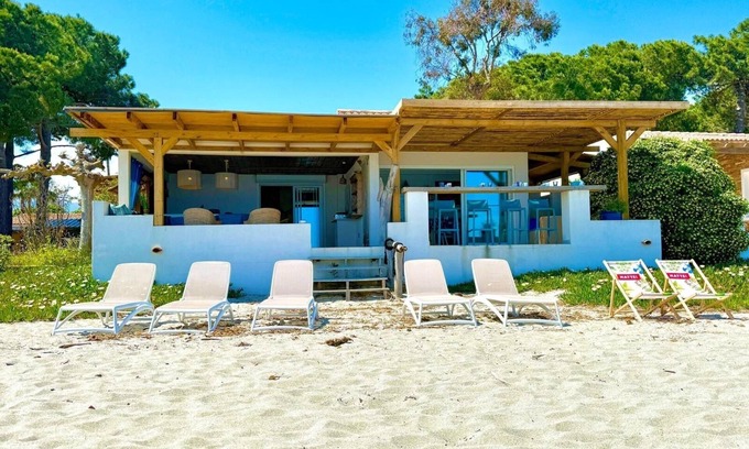 Ghisonaccia Villa | Bungalow 59 - Mini Villa on the beach "feet in the water