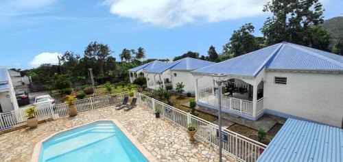 Capesterre-Belle-Eau House | Bungalow charmant à Capesterre 67 m² avec piscine partagee
