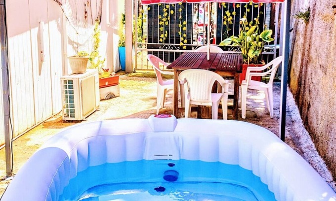 Camporosso House | Bungalow Sixdays 2 with outdoor hot tub.