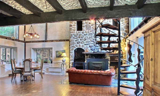 Sainte-Marguerite-du-Lac-Masson House | A Swiss Chalet on Doncaster river + Private Mini Island