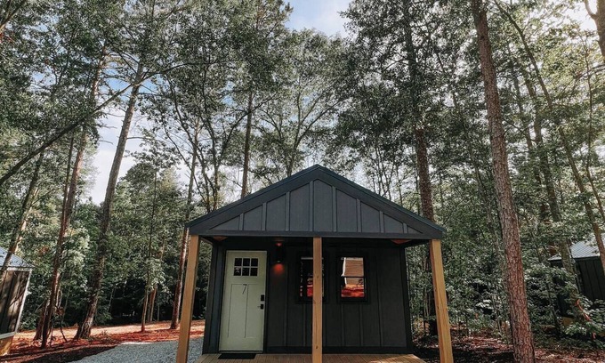 Hartwell RV Rental | Cabin #7: One king-size bed, a kitchenette, and a large gravel parking pad beside the cabin for easy boat or trailer storage.