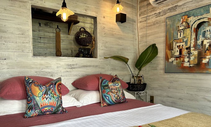 Baldwin Park Cabin | California King Bed with a Lakefront View