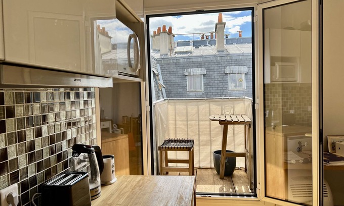 Saint-Victor Apartment | Calm sunny loft studio that looks out onto Paris rooftops in the city center