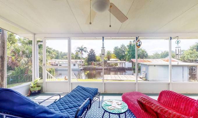 Astor House | Canal-Front Home with Private Covered Boat Dock & Waterfront Screened Porch