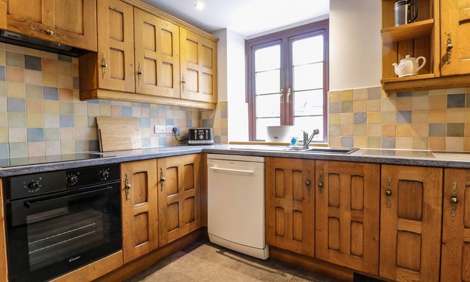 Penmaenpool Cottage | CAPEL SOAR, character holiday cottage, with open fire in Dolgellau