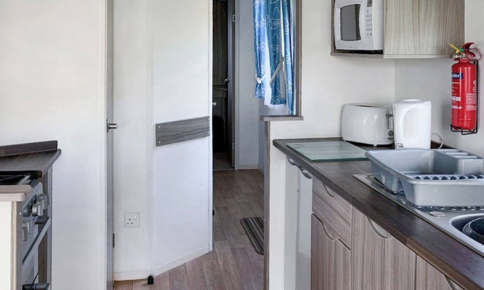 Irstead House | Caravan with one double, two twins.