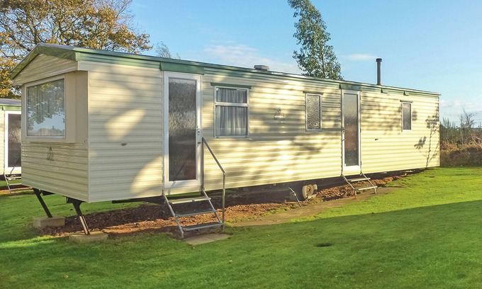 Sandown House | Caravan with one double and two twin.