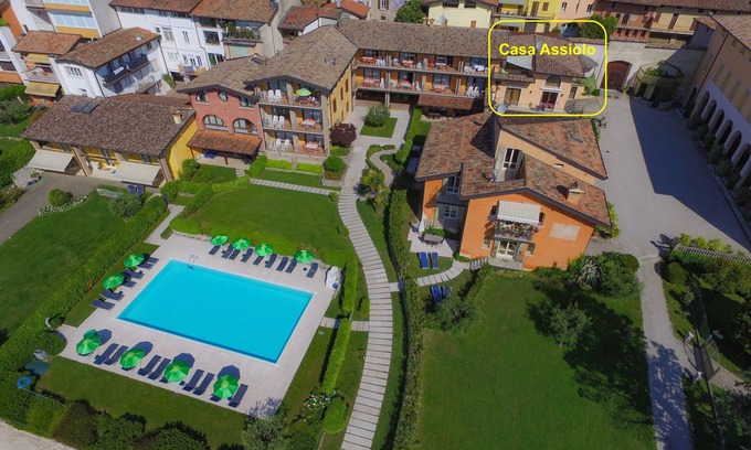 Moniga del Garda Apartment | Casa Assiolo with balcony, garden and lake view