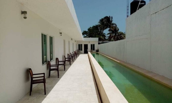 Chicxulub Puerto House | Casa con 5 habitaciones tipo estudio equipadas justo con lo necesario para estar