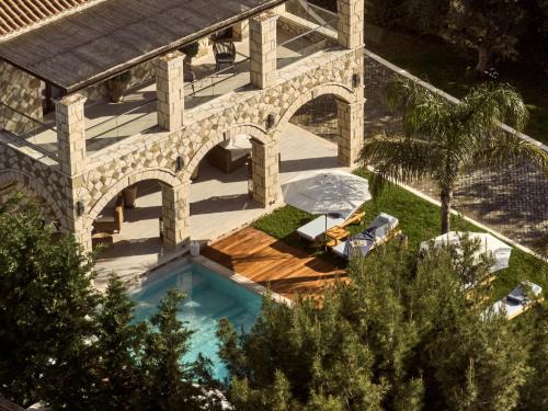 Gaitanion Villa | Casa Di Pietra, a Private Retreat with Heated Pool, By ThinkVilla