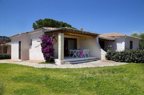 La Conia House | Casa giardino e spiaggia a piedi