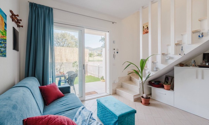 Viddalba Apartment | Casa Lidia, with Shared Pool, Private Parking and Garden; Bouganville Residence in Viddalba