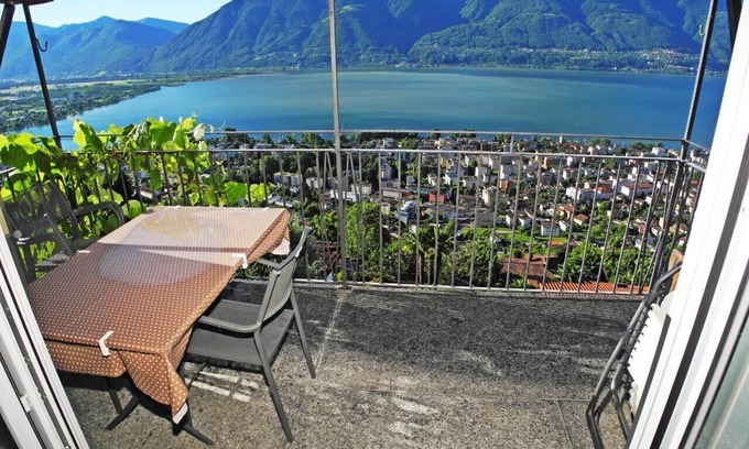 Brione sopra Minusio Apartment | Casa Santa Barbara: Stylish Swiss Holiday Home with Lake and Mountain Views