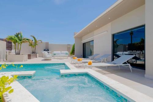 Noord Villa | CD03 - Private Villa with pool - 5min from Eagle Beach - 4BR house