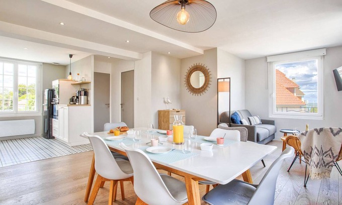 Merville-Franceville-Plage Apartment | Central Merville Franceville apartment with equipped kitchen