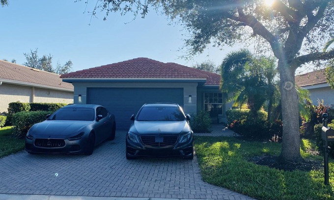 Cascades House | Centrally located Modern Lake-front House in the Heart of Estero