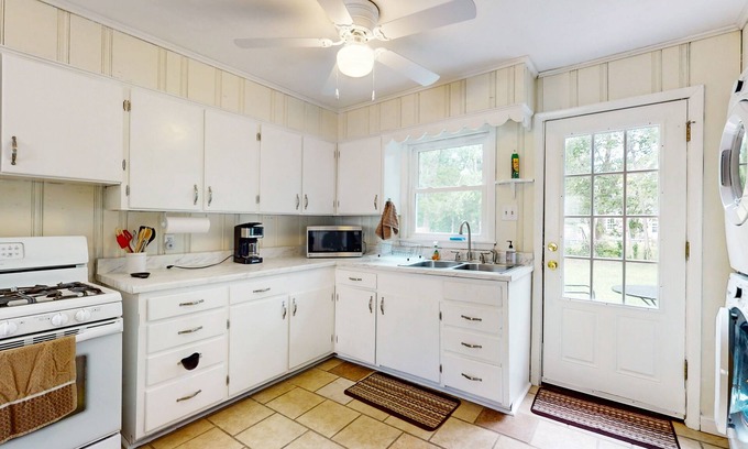 Columbia House | Centrally located with large yard, electric fireplace & w/d